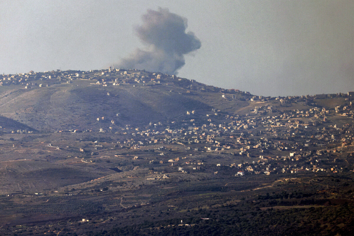 Smoke billows across the horizon along the hills in southern Lebanon from Israeli bombardment from a position along the border in northern Israel on December 10, 2023. (